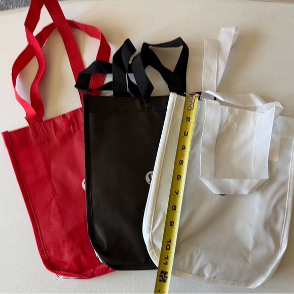 lululemon athletica Handbags - Lululemon shopping bags. Red, Black, and White Tote Bags